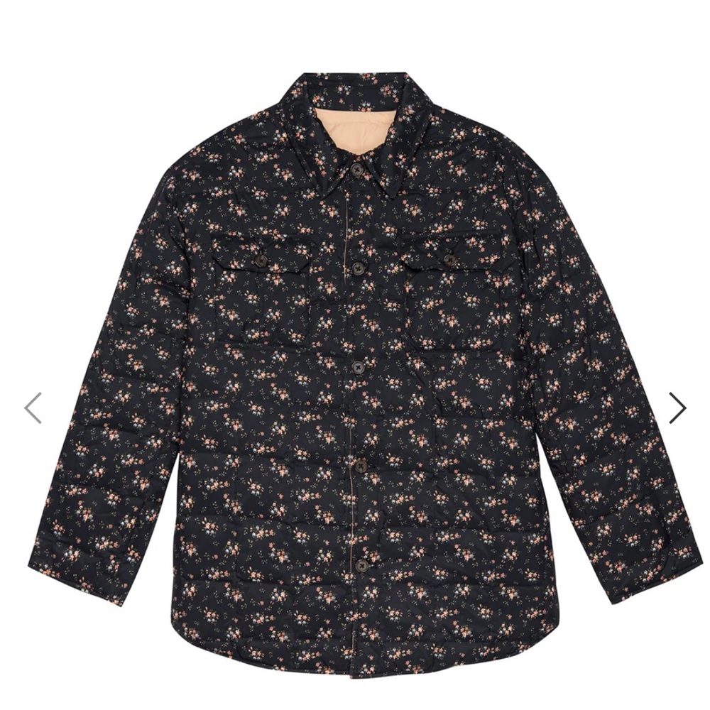 THE REVERSIBLE DOWN TRAPPER PUFFER.